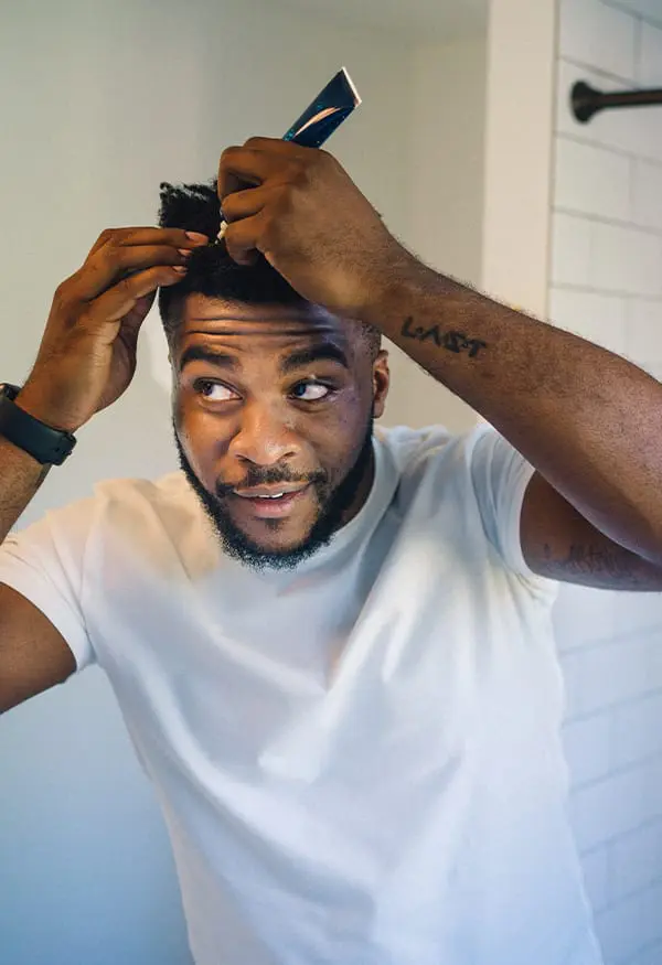 Man using Scalp Serum on his hair
